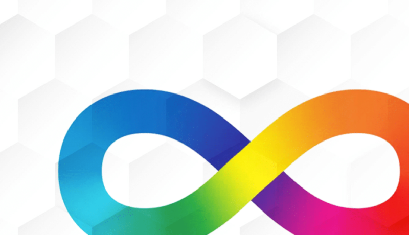 Imagem de fundo branco com textura de vários hexágonos juntos e um grande símbolo do infinito colorido, o símbolo da neurodiversidade.